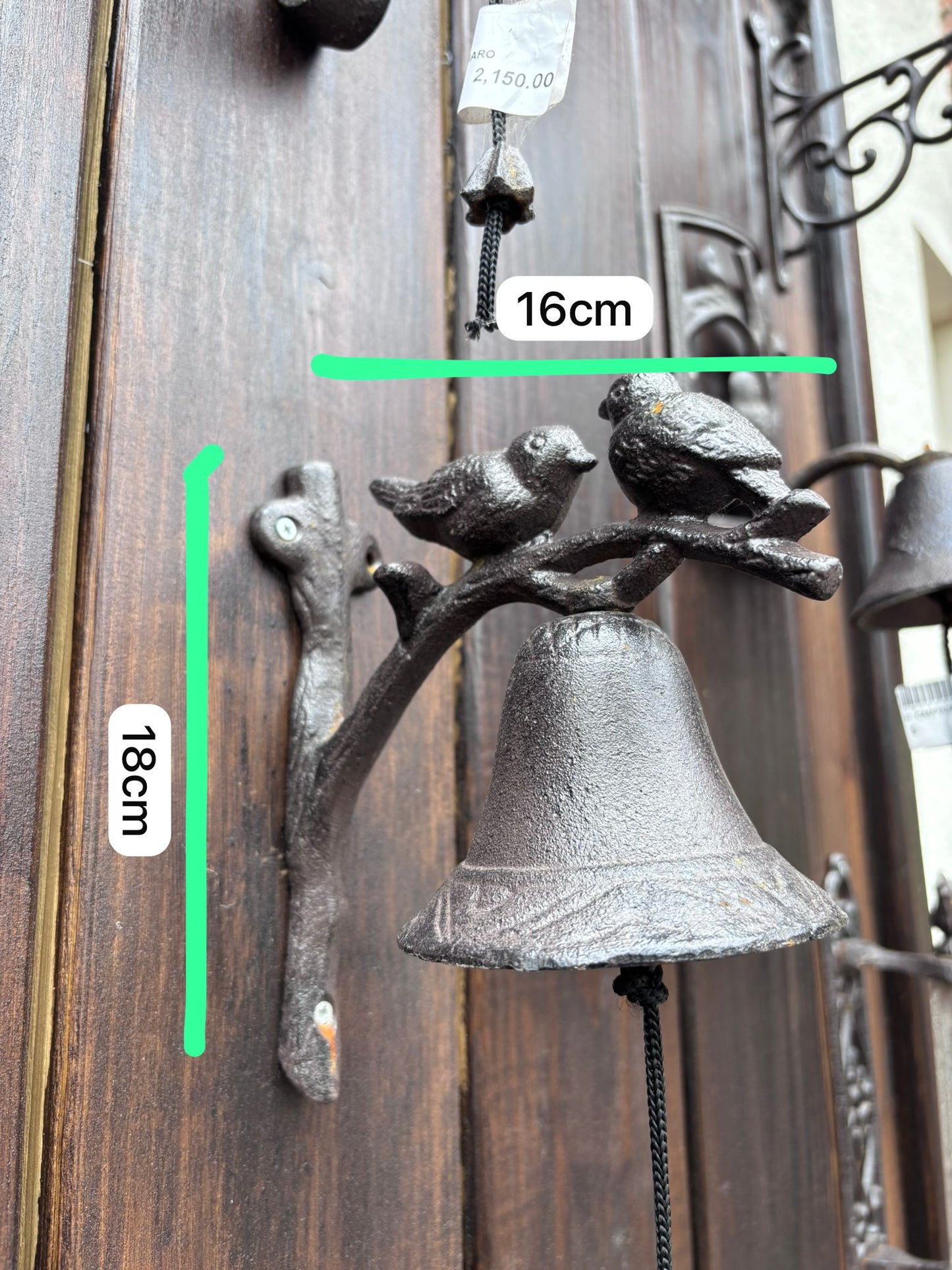 Campana de hierro rama con pájaros