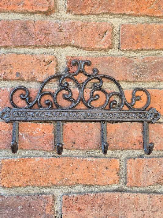 Perchero con guarda de hierro