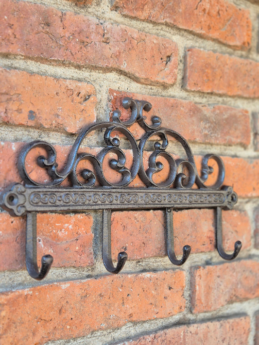 Perchero con guarda de hierro